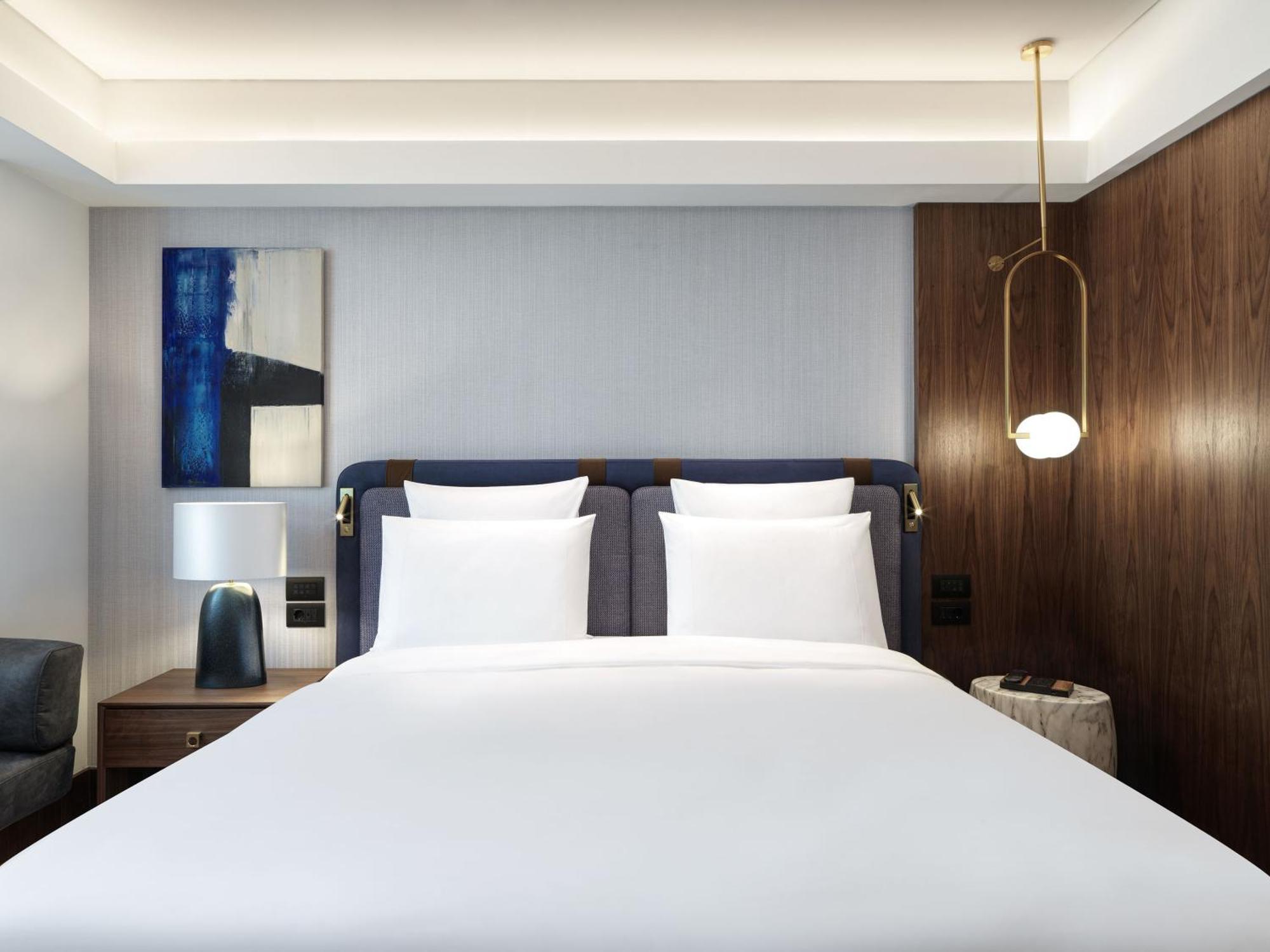 Deluxe Zimmer mit Kingsize-Bett und Balkon